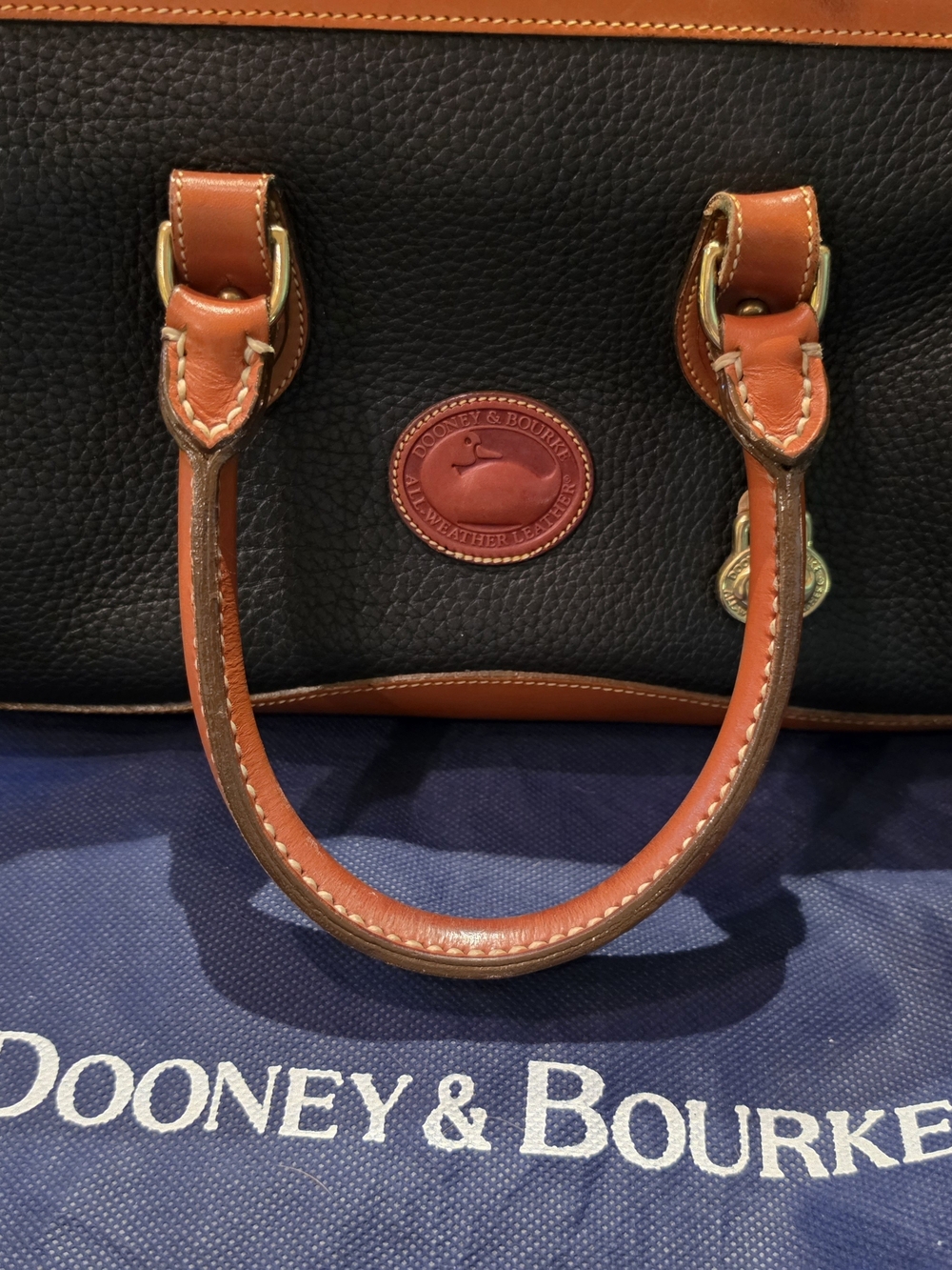 Dooney & Bourke Dark Blue and Cognac Pebbled Leather Satchel